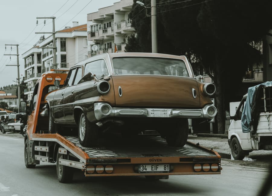 Car on tow truck for Leeds vehicle transport