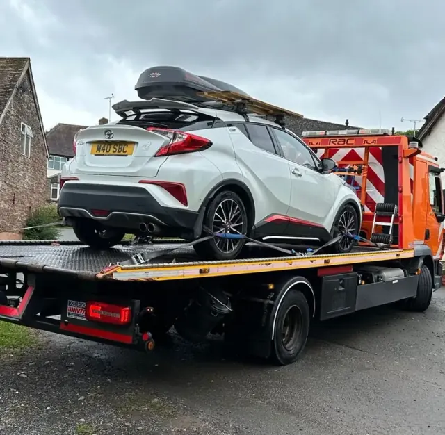 Toyota secured on a vehicle recovery truck