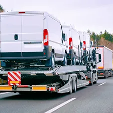 Vans being transported