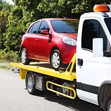 Car being collected on a transporter