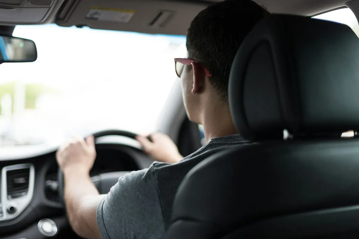 Driver at the wheel of a car